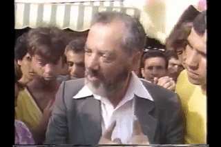 Rabbi Meir Kahane walks and speaks with Sefardic Jews in Shuk 00:01:08